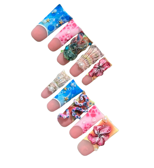 A set of colorful acrylic press-on nails with various designs