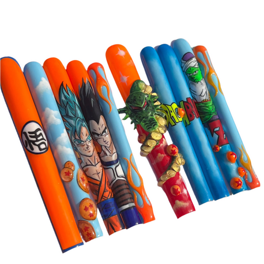 A pack of nail art kits featuring characters from the anime series 'Dragon Ball Z'. The pack includes decals for fingers with various colorful designs and character motifs.